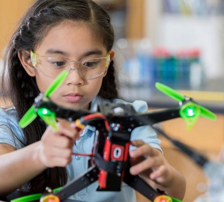 Girl playing with drone