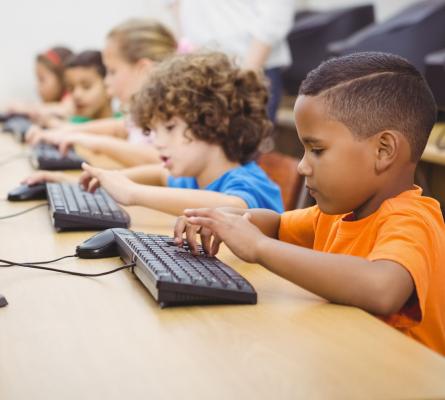 Current State of STEM boys and girls at computer station