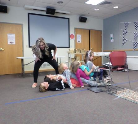 Group of girls laying on each others legs