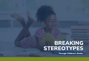 Breaking Stereotypes through children's books. Girl with curl dark hair in a pony tail laying on her stomach with ankles crossed reading a book
