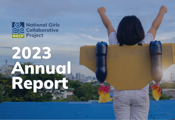National Girls Collaborative Project 2023 Annual Report. Young girl with her arms raised above her head wearing a cardboard and plastic bottle jetpack