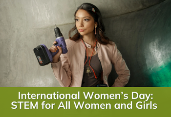 A woman engineer posing with a power tool in her hand 