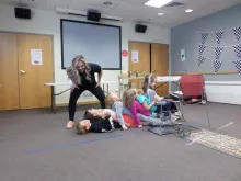 Group of girls laying on each others legs