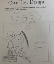 Photo of a worksheet that says, How did you get Newton's Car into the doghouse? with a drawing of two people using a ramp with a car.